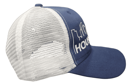 SCP Apparel navy blue and white mesh trucker hat with embroidered Houston skyline graphic and snapback closure