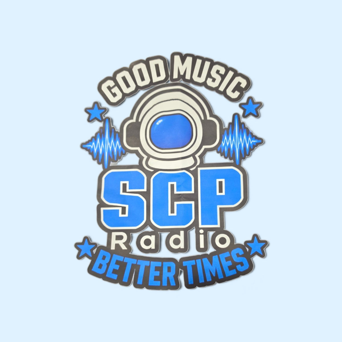 SCP Apparel graphic featuring an astronaut helmet, blue sound waves, and the slogan Good Music, Better Times.