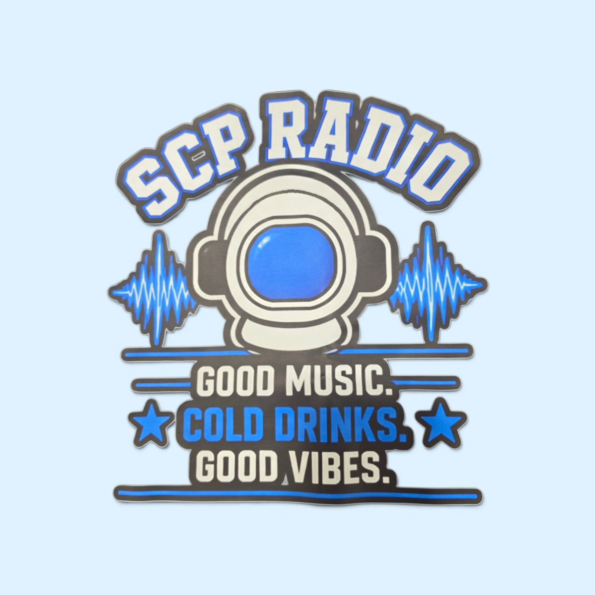 SCP Apparel black crewneck t-shirt featuring a retro astronaut helmet graphic with blue sound waves and text