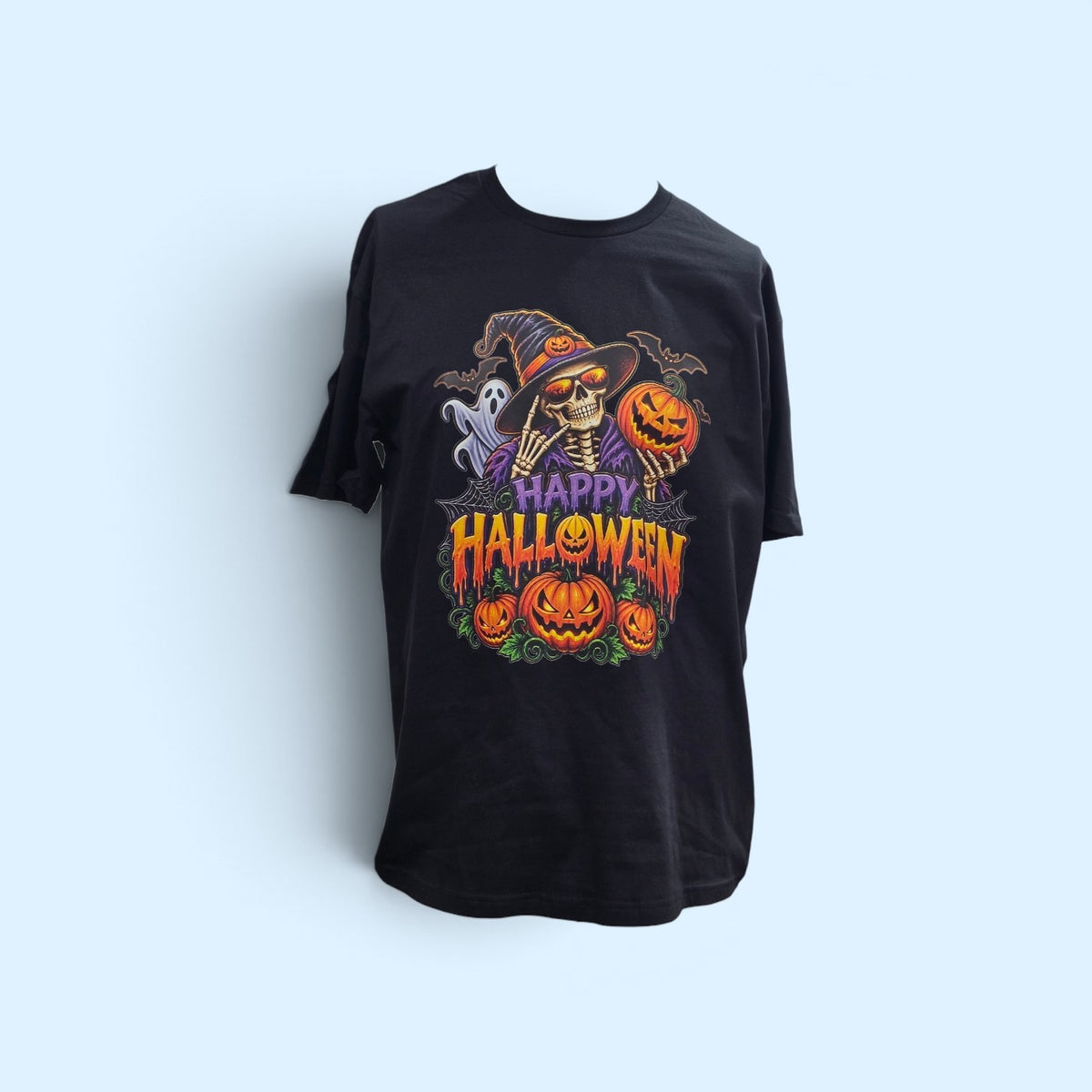 SCP Apparel black cotton crewneck t-shirt featuring a colorful skeleton in a witch hat with jack-o'-lanterns and ghosts