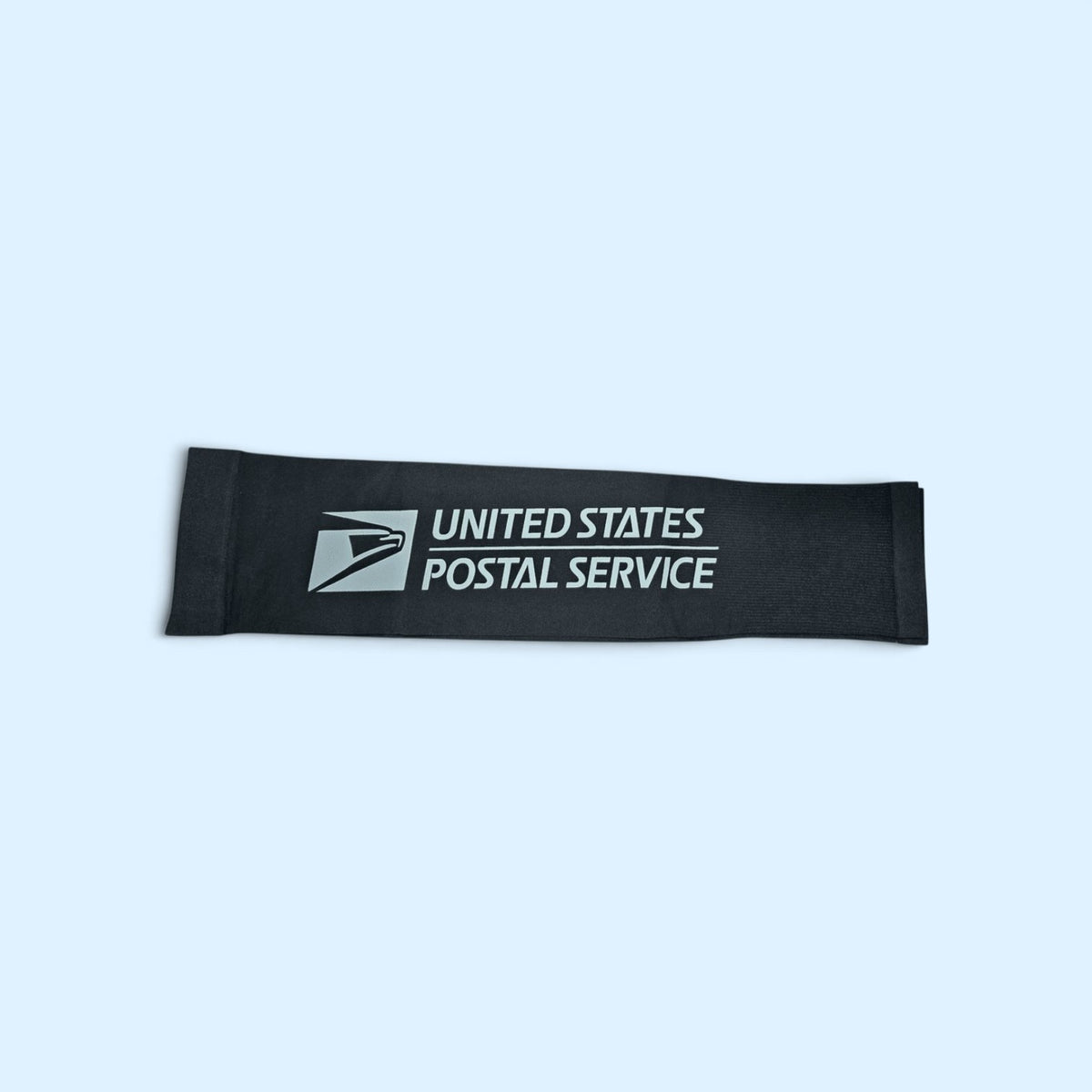 SCP Apparel black athletic compression arm sleeve featuring the white United States Postal Service logo