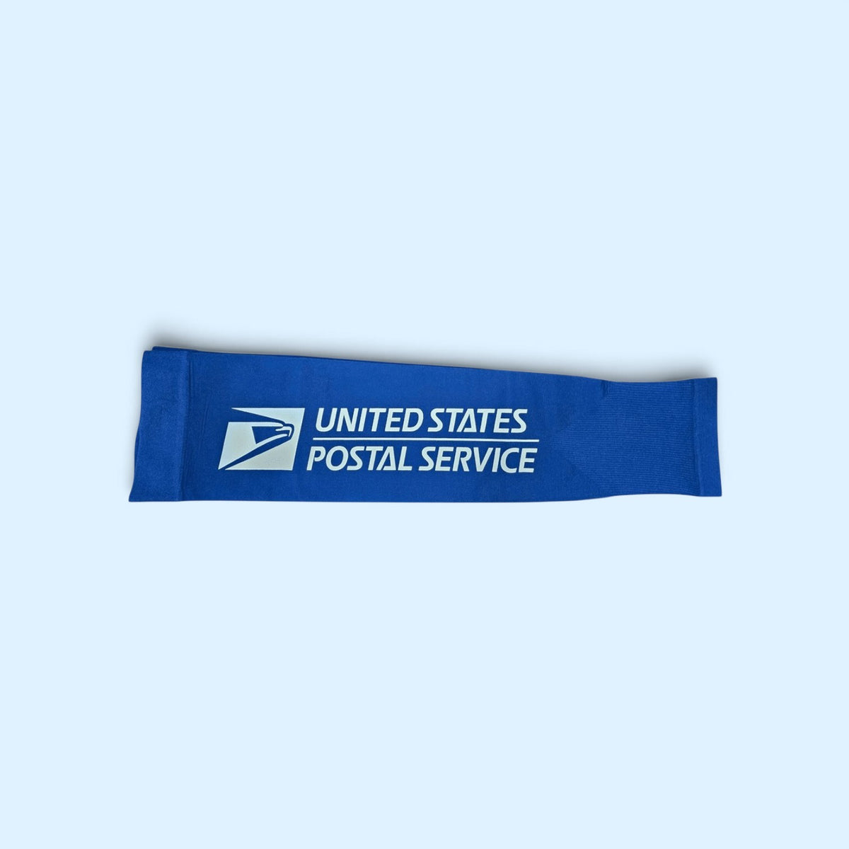 SCP Apparel blue athletic compression arm sleeve with white United States Postal Service logo