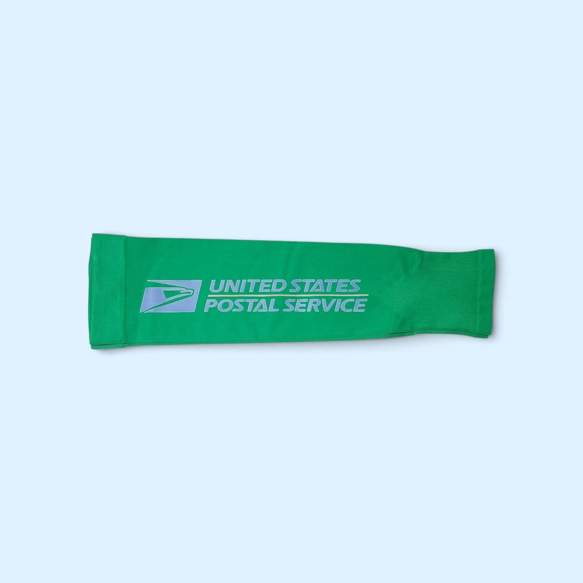SCP Apparel green athletic compression arm sleeve with United States Postal Service logo for moisture-wicking support