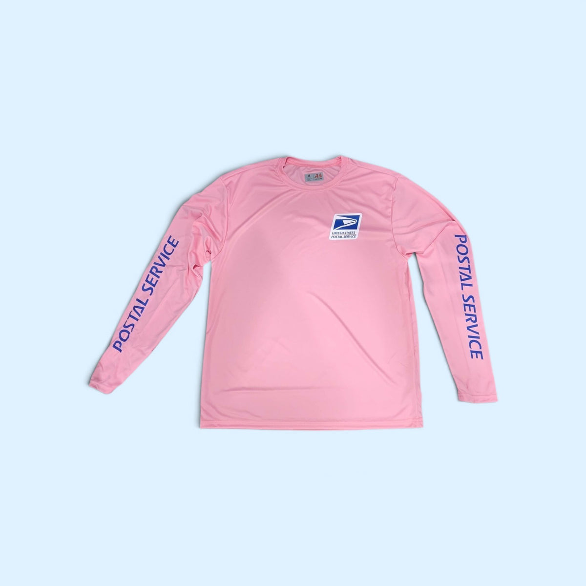 SCP Apparel pink long sleeve performance shirt with United States Postal Service logo and sleeve lettering