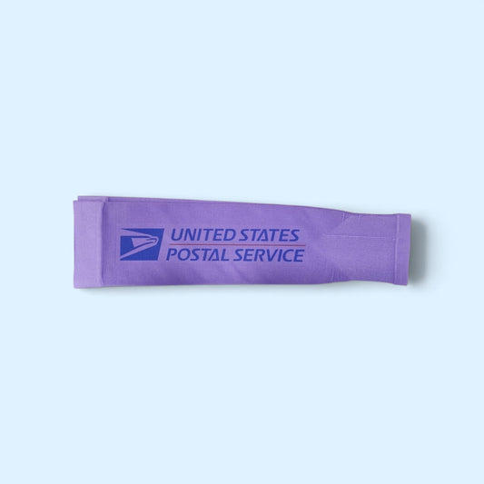 SCP Apparel purple athletic compression arm sleeve featuring the United States Postal Service logo in blue