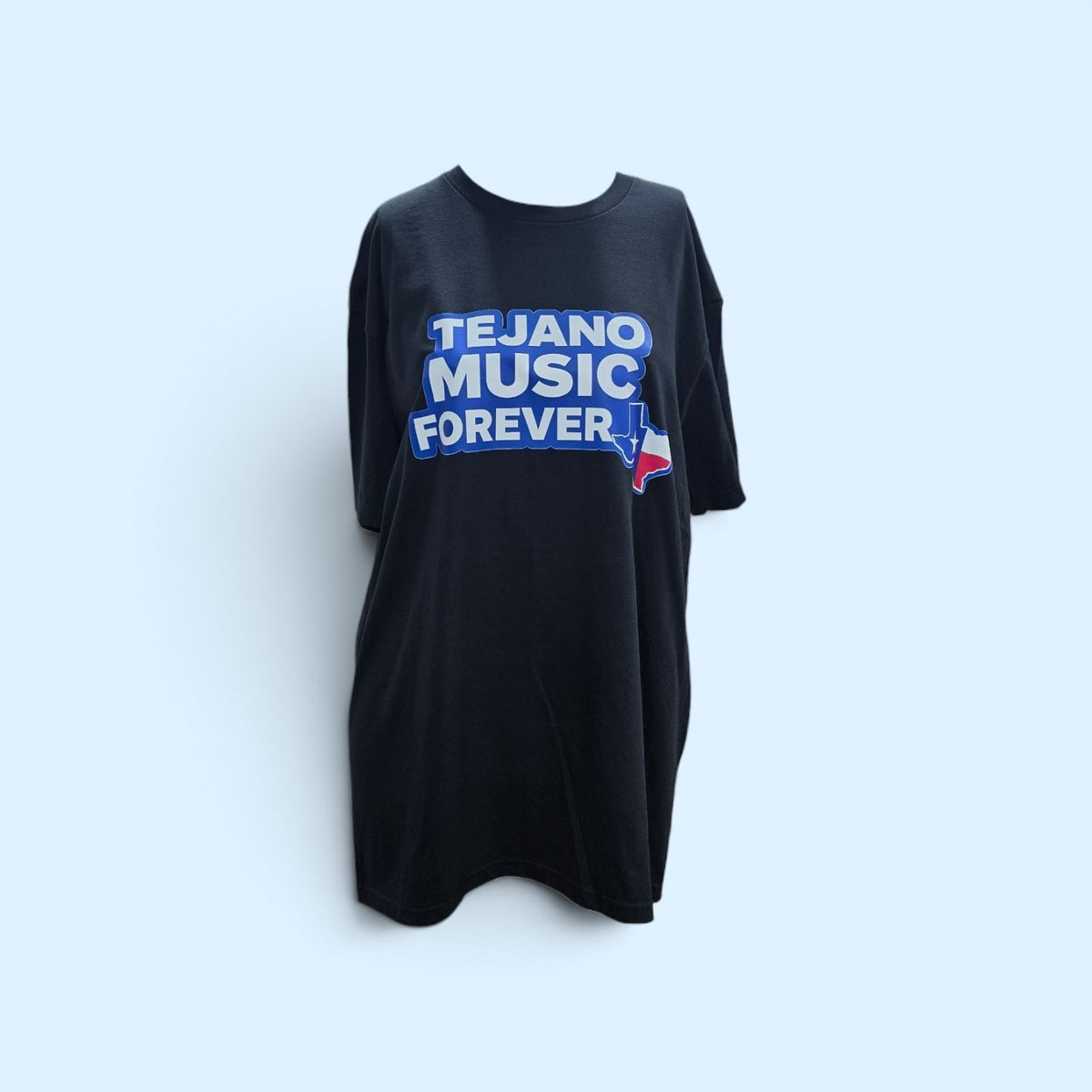SCP Apparel black cotton crewneck t-shirt featuring a Tejano Music Forever graphic with a Texas state silhouette.