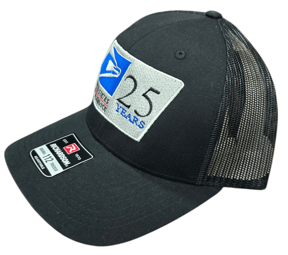 SCP Apparel black Richardson 112 trucker cap with a USPS 25 years service embroidered patch and mesh back