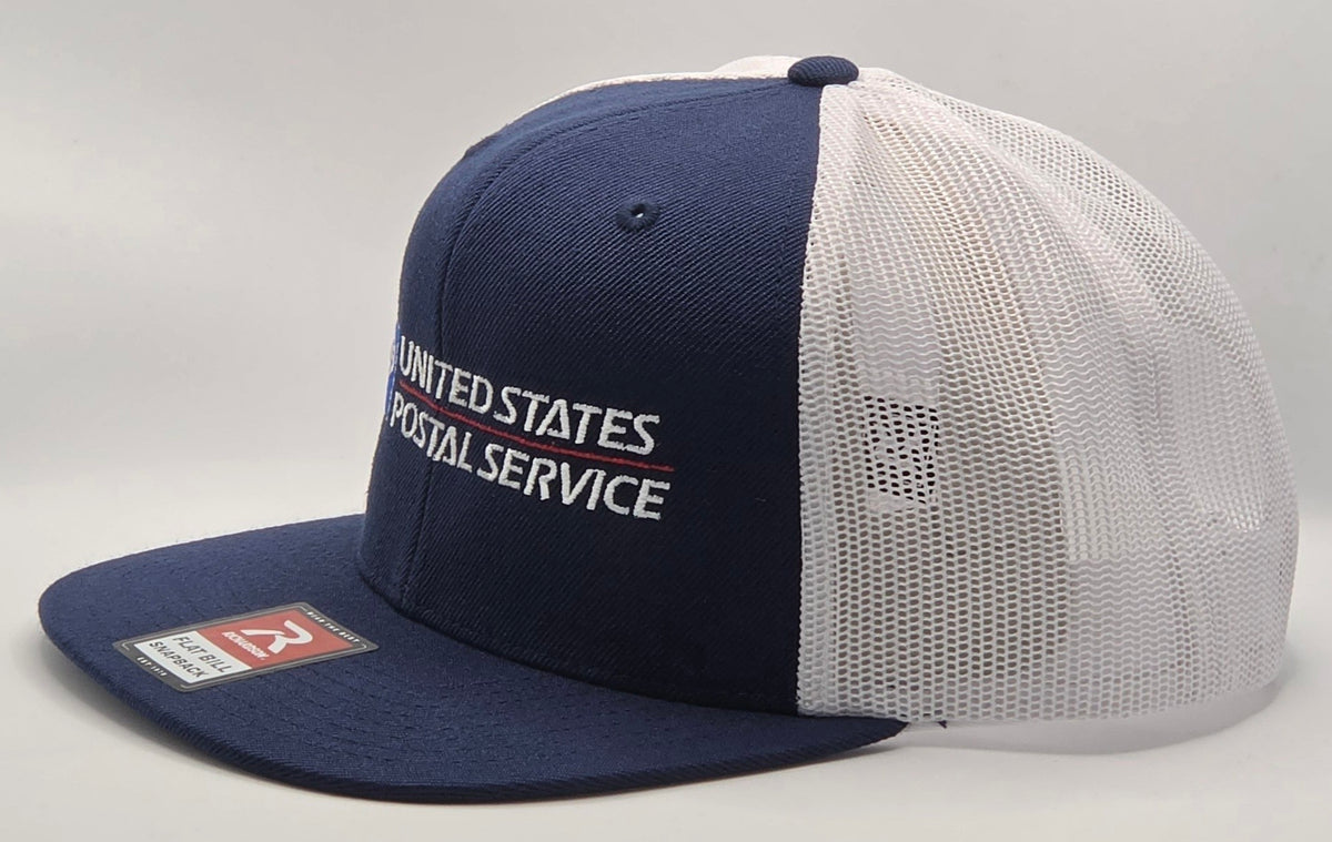 SCP Apparel navy blue and white mesh back trucker hat with embroidered United States Postal Service logo